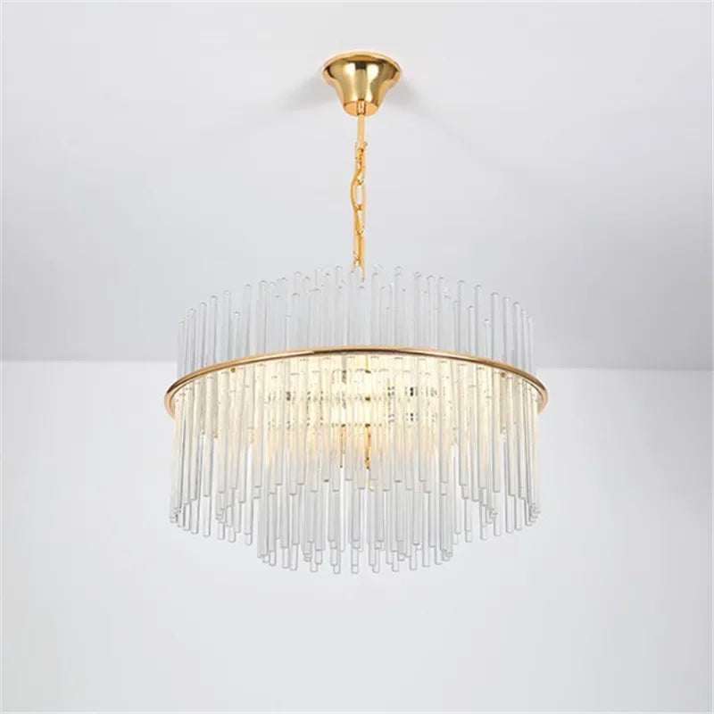 nordisk design krystallysekrone med glasstang og guldfarvet metal