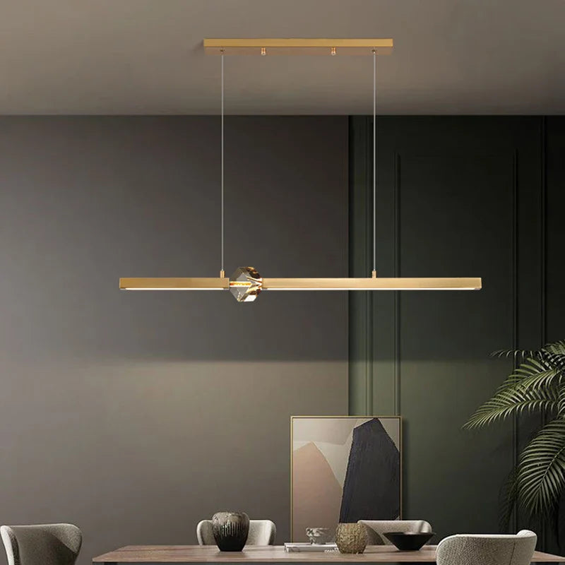 Elegant minimalistisk guldpendellampe