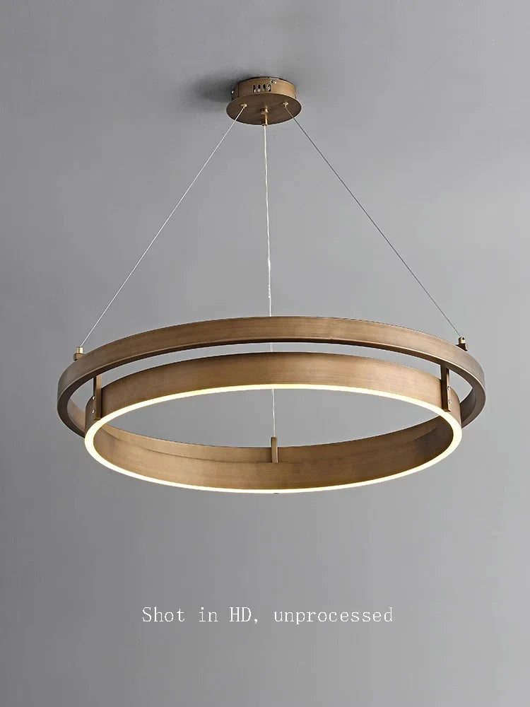 Kreativ lysekrone i bronze med LED-ophæng