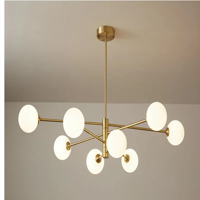 Gylden pendel, lysende elegance